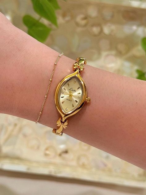 Dainty vintage gold watch ✨ This is a gold tone vintage inspired quartz watch that has a unique watch face and detailed band! - Length: 8 1/2 inches from one clasp to the other. - Works perfectly and has a new battery!  I suggest wiping it down with a soft cloth after each wear to ensure its longevity! Take a look at other beautiful watches here https://www.etsy.com/shop/vintagegirljewels?ref=seller-platform-mcnav As a small business, I'm unable to accept returns/refunds and no cancelation can b Delicate Gold Watch Women, Vintage Watches Women Aesthetic, Vintage Dainty Watch, Dainty Watches, Dainty Gold Watch, Gold Watch Women, Unique Watches Women, Dainty Watch, Watch Minimalist