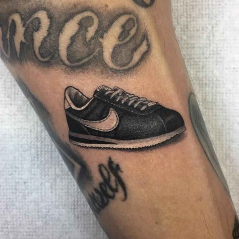 Tattoo master and musician Dan Smith, authors realistic sneakers and shoes tattoo | USA, England, New Zealand Shoe Tattoo Ideas, Best Tattoo In The World, Sneaker Tattoo, Shoes Tattoo, Nike Tattoo, Shoe Tattoo, Cortez Shoes, Shoe Tattoos, Tattoos For Men And Women