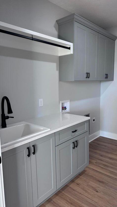 L Laundry Room Layout, Laundry And Fridge Room, Laundry Room Configuration, Laundry Room Shelf Ideas Over Washer With Open Top Washer, Rectangular Laundry Room Layout, Grey Laundry Cabinets, Washer And Dryer In Basement, Small Laundry Room Ideas With Top Loading Washer, L Shaped Laundry Room Design