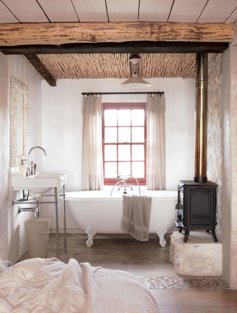 A wood burning stove by the bathtub?!  Oh yes!  All it's missing now is a flatscreen on the wall!  I'd never leave the tub! Cottage Bathroom, Clawfoot Tub, Wood Burner, Beach Cottage, Farmhouse Bathroom, Wood Burning Stove, Beautiful Bathrooms, Bathroom Inspiration, My Dream Home