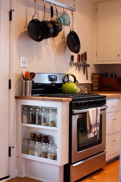 love the storage on the side Storage Above Stove Ideas, Range At End Of Cabinet Run, Storage Ideas For Small Spaces, Pinterest App, Rental House, Ideas For Small Spaces, Bad Idea, Cabin Plans, Kitchen Cabinets In Bathroom