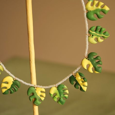 Inspired by one of my favourite house plants - The gorgeous monstera deliciosa. This little jewellry set came to life with polymer clay, and I’m loving the mix of greens and yellows. The texture and shape of the monstera just feels so lively, doesn't it? 😊 It feels like a fun way to carry a bit of nature with me, and I hope it resonates with all the other plant and leaf lovers out there! 💚✨ #monsteradesign #monsterajewelry #monsteraart #plantjewellery #plantearrings #plantnecklace #houseplan... Monstera Deliciosa, My Favourite, House Plants, Polymer Clay, Texture, Plants, Design, Art, Nature