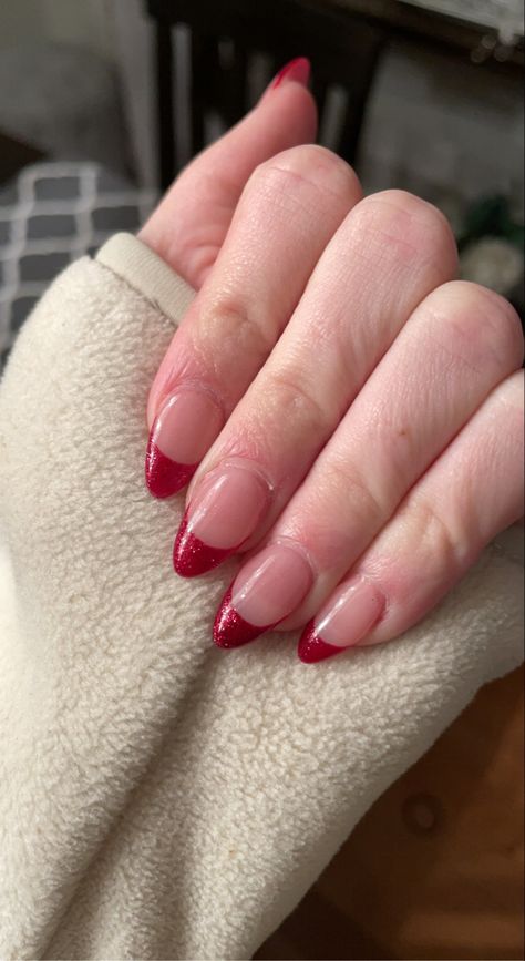 Red Shimmer French Tip Nails, Holiday Nails French Tip Sparkle, Christmas Almond French Tip Nails, Red Glitter French Tip Nails Christmas, Sparkly Red French Tip Nails Almond, Sparkly Red Tip Nails, Red Glitter French Tip Nails Almond, Sparkle Red French Tip, Red Sparkle French Tip