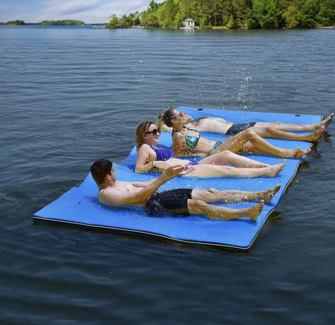 This swim water pad is made of highquality 3-layer XPE foam, which provides superior stability and comfort on water. You can relax your head on the pillow (9 ft only) and allow cooling water pad cradles your body just below the surface of the water, keeping you cool on hot summer days. This versatile swim platform can be used as a lounge, swim raft,or a launch pad for any water sports. Amazon affiliate link below: Floating Mat, Good Gifts For Parents, Water Pad, Water Mat, Pool Rafts, Floating Water, Floating Island, Roll Pillow, Lake Time