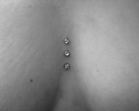 Chest dermals Dermal Body Piercings, Middle Chest Piercing, Chest Dermal Piercing Center, Chest Piercings For Women, Chest Dermal Piercing, Piercing Chest, Dermal Piercing Chest, Chest Dermal, Sternum Piercing