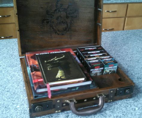 Custom D&D Storage. Birthday present for Noah Waterdeep Dnd, Dnd Storage, Dnd Room Ideas, Dnd Sheet, Games Storage, Dnd Room, Dragon Project, Dnd Diy, Rpg Board Games