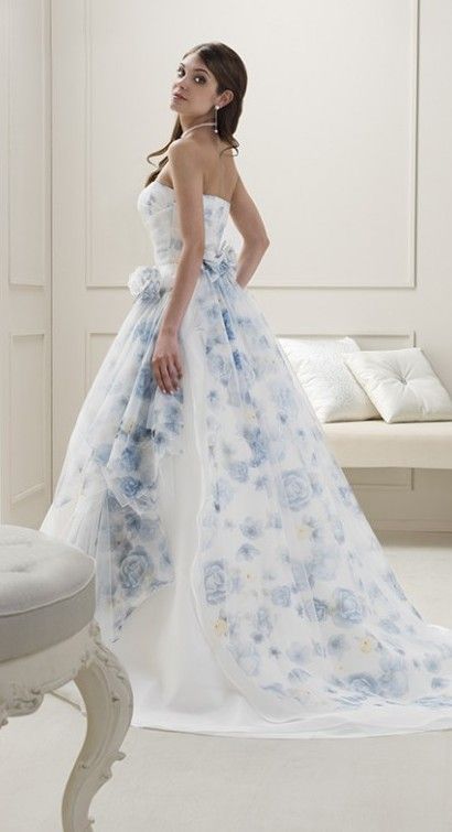 wedding dress with blue accent from Fabio Gritti White Wedding Dress With Light Blue Accents, Wedding Dress With Light Blue Accents, Dark Blue And White Wedding Dress, Wedding Dress Blue Flowers, Blue Flower Wedding Dress, White Wedding Dress With Blue Flowers, Light Blue And White Wedding Dress, Wedding Dresses With Blue Accents, White Wedding Dress With Blue Accents