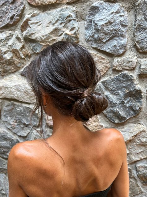 Undone Bun Wedding, Low Bun With Loose Curls, Prom Simple Updos, Dark Hair Low Bun, Prom Updos Simple, Simple Bun Hairstyles Wedding, Minimal Bridesmaid Hair, Simple Wedding Hair Bun, Prom Hair Simple Updo