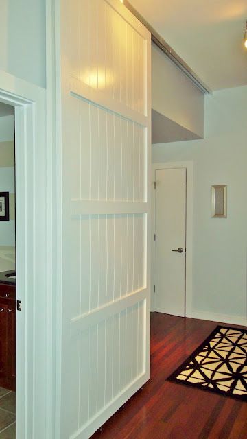 Sliding Doors- I need this to temporary close off a section of the house. I am going to make a small version then maybe upscale it. Loft Doors, Temporary Door, Loft Door, Dog Gates, Diy Sliding Door, Dog Gate, Room Decorating, Interior Barn Doors, Barn Doors Sliding