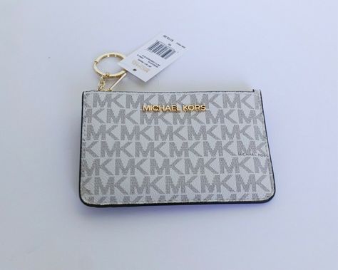 NEW WITH TAG Michael Kors Jet Set Travel Small Top Zip Coin Pouch with ID Key Holder  MK Signature  PVC Leather  Vanilla/Brown 100% Authentic  Retail: $ 118 Plus Tax  Gold Toned Hardware 2 Card Slots, ID Window at Back 1 Slip Pocket  Zip Top Closure Custom Fabric Lining 1 Key Holder 5.25"(L) X 3.5"(H) X 0.25"(D) Very Clean, Smoke-Free and Pet-Free Environment. Michael Kors Items are from An Authorized Michael Kors Store and I am not affiliated with Michael Kors. International buyers are responsi Michael Kors Card Holder, Michael Kors Store, Bling Car, Bling Car Accessories, Mk Wallet, Keychain Wallet, Small Pouch, Junior Year, Michael Kors Wallet