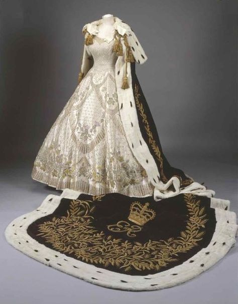 Purple Robe of Estate and Coronation Dress of Queen Elizabeth II, United Kingdom (1953). Robe is 21 feet long and made of silk velvet, ermine, silk, and gold thread. Gown is made of satin, gold thread, silver thread, seed pearls, and crystals. Coronation Gown, Coronation Robes, Royal Gowns, Era Victoria, Gaun Abad Pertengahan, Coronation Dress, Old Dresses, Vintage Gowns, Antique Clothing