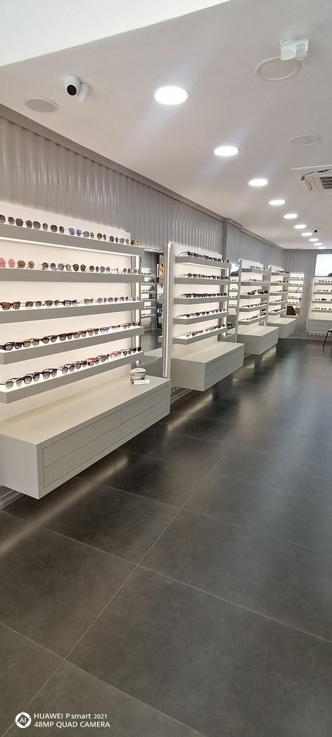 Optometry Clinic Interior Design, Optical Showroom Interior, Optical Office Design, Eyewear Store Design Optical Shop, Opticals Showroom, Opticians Store Design, Retail Cabinets, Optical Store Design, Optical Shop Interior Design