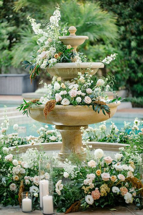 Fountain Decoration Ideas Wedding, Golden Wedding Flowers, Fountain With Flowers Wedding, Flower Filled Wedding, Old South Wedding Theme, French Backyard Wedding, Garden Themed Wedding Decor, Courtyard Wedding Decorations, Flowers In Fountain Wedding