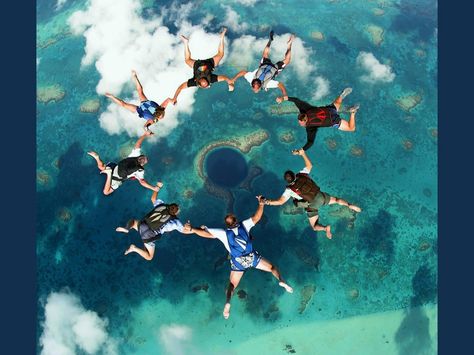 Photo of the Day: Skydiving the Great Blue Hole Blue Hole Belize, Parachute Jump, Great Blue Hole, Sky Diving, Caye Caulker, Blue Hole, The Great, Skydiving, A Circle