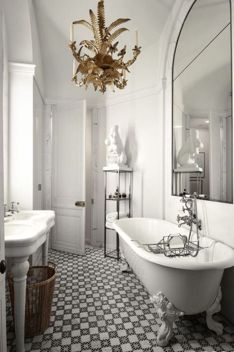 It’s timeless and classic, calming and cool. Whether you’re looking to go full-monochrome or build a clean canvas for your favorite decor, these grey bathrooms prove how dynamic the shade can be. #graybathrooms #graybathroomideas #monochromaticbathrooms #monochromebathrooms #bathroomideas #graybathroomideas #elledecor Parisian Bathroom, Luxe Bathroom, Black White Bathrooms, Bathroom Design Trends, Bad Inspiration, Guest Bathrooms, Bathroom Trends, Trendy Bathroom, Elegant Bathroom