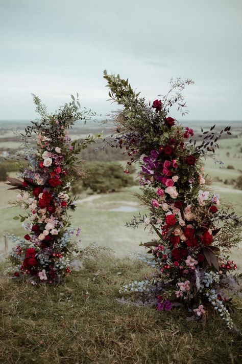 Colourful & lush wedding ceremony floral arbour for a luxe intimate destination elopement. Floral Arbour, Branch Arch Wedding, Moody Wedding Flowers, Outside Ceremony, Rey Aesthetic, Wedding Branches, Lush Wedding, Wedding Alters, Wedding Renewal