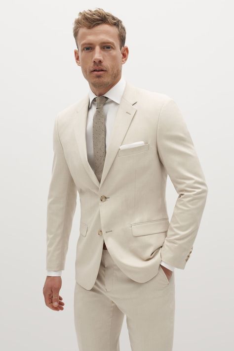 Play into the neutral-hued trend with this light tan suit, which feels especially perfect for early fall nuptials. It’s made of a stretchy fabric meant to keep you comfortable for hours, and the light color is sure to pair well with almost any wedding-day color palette. Light Tan Suit, Tan Groomsmen Suits, Tan Groomsmen, Tan Suit Jacket, Cream Suit, Suit Man, Grey Suit Jacket, Tan Suit, Tan Dress