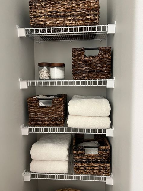 Closet organization linen closet basket organization closet organization Wire Shelf Linen Closet, Bathroom Shelving Storage Ideas, Linen Closet Organization Ideas Bathroom, Linen Closet Shelving Ideas Diy, Bathroom Closet Organization Storage, Towel Storage Without Linen Closet, Bathroom Closet Open Shelving, Deep Linen Closet Organization Ideas, Minimalist Linen Closet