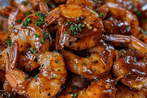 Enjoy this rich and flavorful New Orleans-Style BBQ Shrimp recipe with a buttery, spicy sauce and fresh shrimp. Perfect with French bread! New Orleans Shrimp Recipes, Shrimp New Orleans Recipe, New Orleans Bbq Shrimp Recipe, Bbq Shrimp Recipe, Barbeque Shrimp, New Orleans Bbq Shrimp, Shrimp Bbq Recipes, Barbecue Shrimp, Fresh Shrimp