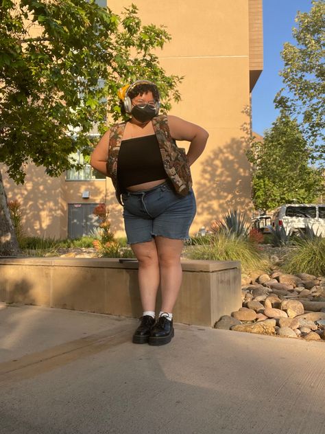 a non-binary person wearing black string tank top, denim shorts, open bear vest, white frilly socks, doc marten 1461 platforms in an outdoor space Doc Martens 1461 Platform, Black Doc Martens Outfit, Platform Doc Martens Outfit, White Socks Outfit, White Frilly Socks, Platform Doc Martens, Martens Outfit, Doc Martens Outfit, Frilly Socks