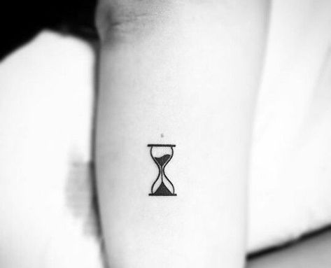 160+ Beautiful Hourglass Tattoos Designs With Meaning (2023) - TattoosBoyGirl Hourglass Tattoo Men Simple, Hourglass Finger Tattoo, Hourglass Small Tattoo, Hourglass Minimalist Tattoo, Look Up Tattoo, Minimal Hourglass Tattoo, Tiny Hourglass Tattoo, Minimalist Hourglass Tattoo, Hourglass Tattoo Simple