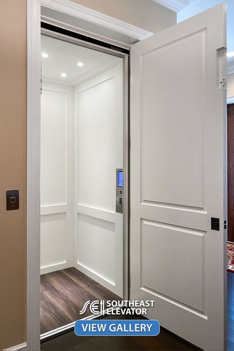 White Shaker style residential elevator with a touchscreen car operating panel and four LED lights Indoor Home Elevators, Indoor Elevator Home, Home With Elevator, Residential Elevator Design, Home Elevator Ideas, Hidden Elevator In House, Home Elevators Small, Residential Elevator Interior Design, Home Lifts Elevator