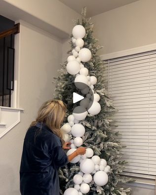 6M views · 65K reactions | Unique way of decorating a Christmas tree | A new way to decorate your tree this year! 🎄 | By LADbible | Facebook Big Bulbs On Christmas Tree, Christmas Trees With Large Ornaments, Cascade Ornaments On Tree, Snowball Christmas Tree, How To Put Christmas Balls On Tree, Christmas Ball Garland Decorating Ideas, Big Christmas Balls Decor, How To Decorate My Christmas Tree, Christmas Bulb Clusters On Tree