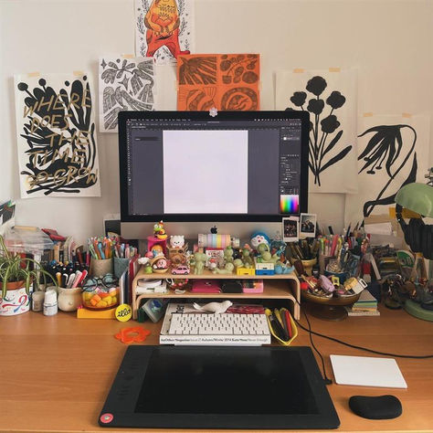 Check out Maylee Keo's desk setup equipped with a Wacom Intuos Pro, lots of pens and markers, photos, cute toys and cups! What do you keep around your desk? Click the link to choose a Wacom tablet of your very own! #wacom #wacomtablet deskgoals #workfromhome #homeoffice Desk Setup With Drawing Tablet, Digital Artist Desk Setup Aesthetic, Digital Art Setup Desk, Drawing Tablet Setup, Graphic Designer Desk Setup, Digital Artist Desk Setup, Digital Artist Setup, Digital Art Setup, Artist Desk Setup