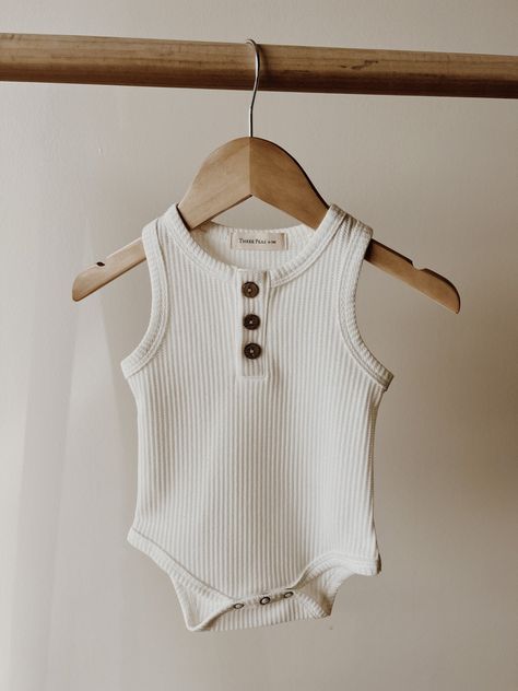 They are great for every day wear, layering, or dressing up. This soft and cozy wardrobe staple will surely be a favorite. Cozy Wardrobe, Classic Baby Clothes, Newborn Clothing, Bodysuit White, Baby Boutique Clothing, Waffle Fabric, Baby Fits, Tank Bodysuit, Carters Baby Boys