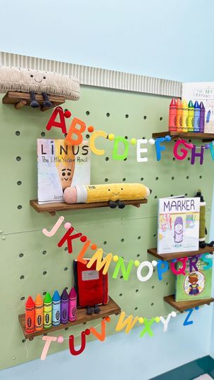 18K views · 2.6K reactions | One of my favorite spaces in my room, my pegboard! 😍🖍️  This summer I stumbled upon a YouTube video by @ystreetstudio showing her process of building a decorative pegboard. After watching the video, I immediately got the supplies and got to work on building this for my classroom! I filmed the entire process and plan on sharing that soon 🔨🪚   I decorated it for this month with my school supply plushes from @jellycat and back to school themed read alouds! It just screams Kindergarten to me and I love it! 😍 . . . #kindergarten #kindergartenclassroom #classroominspiration #classroomdisplay #classroomideas #diy #elementaryteacher #elementaryschool | Teach with Heath | Jackson 5 · ABC Decorative Pegboard, Read Alouds, School Supply, Jackson 5, In My Room, Classroom Inspiration, My Classroom, Classroom Displays, My School