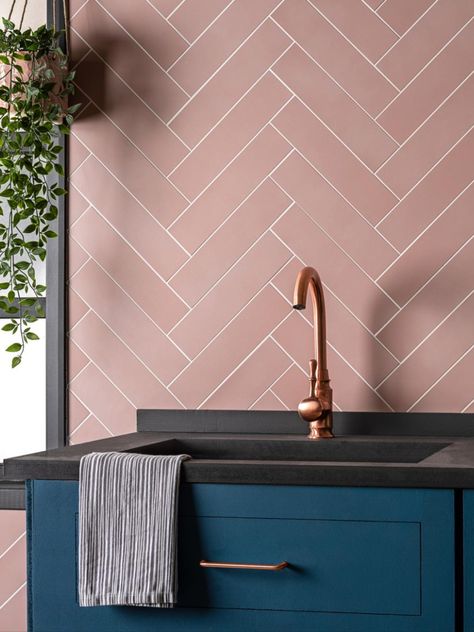 Add pretty colour and interesting shape to your kitchen walls with textured pink metro tiles laid in a herringbone pattern. Click for more beautiful tile ideas #homedecor Image: Walls and Floors Navy Pink Kitchen, Teal And Pink Kitchen, Pink Herringbone Tiles, Mountain Kitchen Ideas, Metro Tiles Kitchen, Metro Tiles Bathroom, Kitchen Tile Ideas, Pink Bathroom Ideas, Blue Kitchen Tiles