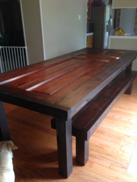 Table made out of old door. Door Into Table, Old Door Tables, Door Tables, Door Dining Table, Old Door Projects, Old Wood Table, Old Window Projects, Glass Kitchen Cabinet Doors, Recycled Door