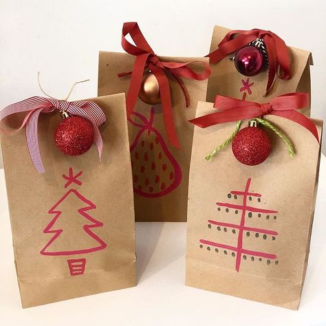 Hand painted Brown Paper Bags, beautiful grosgrain ribbon and baubles and a whole lot of love is what you can expect this Christmas at… Decorate Lunch Bags Brown Paper, Brown Bag Christmas Wrapping, Decorated Gift Bags For Christmas, Paper Bag Ornaments Diy, Painted Paper Bags, Paper Bag Decorating Ideas Christmas, Brown Paper Bag Christmas Crafts, Brown Gift Bag Decorating Ideas, Christmas Brown Paper Bags