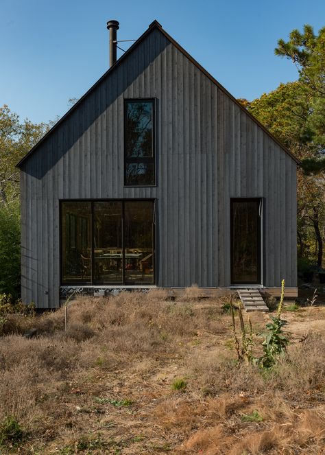 We used the stain "Black Solid" over this knotty rough faced cedar siding came out perfectly. A simple, yet elegant design. Cedar Siding Exterior, Cedar Lap Siding, Nickel Gap, Cedar Shiplap, Shiplap Siding, Cedar Stain, Sauna House, Lake Houses Exterior, House Paint Color Combination