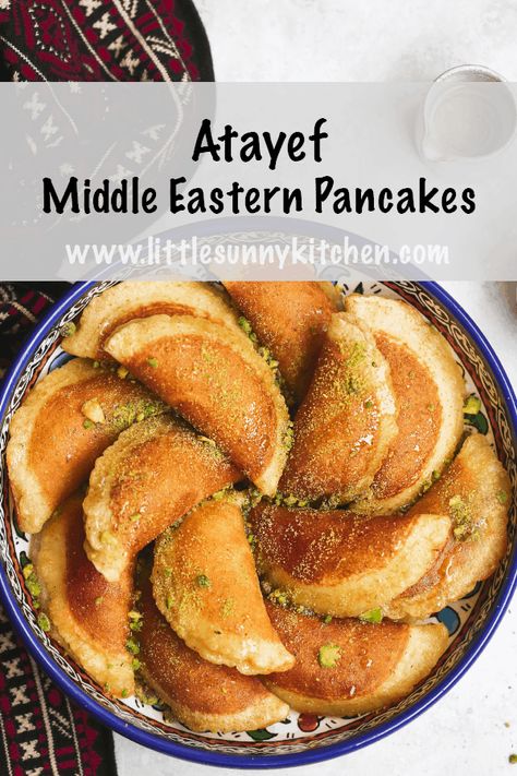 Atayef or Qatayef are Middle Eastern pancakes filled with white cheese or nuts then soaked in a rose sugary syrup. They are only made and served during the Holy month of Ramadan. Here's a detailed recipe to make Atayef from scratch. #atayef #qatayef #gatayef #ramadan Middle Eastern Brunch Ideas, Easy Middle Eastern Desserts, Gluten Free Middle Eastern Recipes, Kanafah Recipe, Vegan Arabic Food, Katayef Recipe, Atayef Recipe, Middle Eastern Recipes Arabic Food, Arabisk Mat