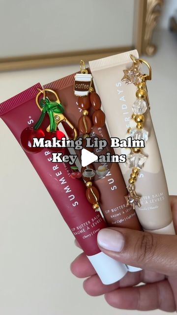 Aman on Instagram: "Making my favorite lip balms into key chains✨  @summerfridays   Which one is your favorite?   inspo: @j.xnah 🫶🏽 #lipbalm #summerfridays #lipbutter #lipbalmkeychain #diy" Lip Balm Organization, Lip Balm Charms Diy, Lipgloss Holder Keychain Diy, Chapstick Keychain Diy, Diy Lip Gloss Keychain, Lip Balm Keychain Aesthetic, Summer Fridays Lip Balm Keychain, Lipgloss Keychain Diy, Lipgloss Charms Diy