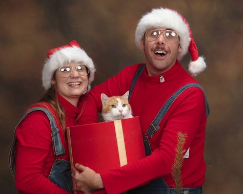 My wife and I recently had out Christmas photos done...We even borrowed a cat for extra cringe. Christmas Pictures With Cats Family Photos, Cat Family Christmas Cards, 90s Christmas Pictures, Cheesy Family Christmas Photos, Christmas Card With Dog Couple Funny, Funny Cat Christmas Cards Family Photos, Holiday Card Photos, Family Christmas Pictures With Cat, Corny Christmas Photos