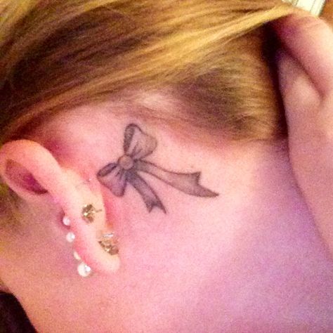 Bow tattoo Bow Tattoo Behind Ear, Butterfly Ankle Tattoos, Girly Tattoo, Behind Ear Tattoos, Back Dimples, Ankle Tattoos, Bow Tattoo, Lizzy Grant, Tramp Stamp