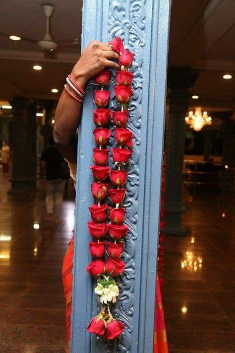 Getting a decorative and beautiful varmala for the wedding day is a tiny detail but an important one. Get some ideas for your varmala from here!#varmala #jaimala #varmalainspiration #weddinginspiration #indianwedding #weddingoutfit #realwedding #india #indian #indianweddingdecor #bridalinspiration #bridalwear Varmala Indian Weddings, Red Rose Garland, Rose Garland Wedding, Indian Wedding Garland, Indian Wedding Flowers, Floral Sash, Flower Garland Wedding, Marriage Decoration, Wedding Garland