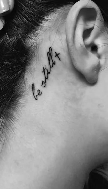 Tiny Tattoos Behind Ear Ideas, Quotes Behind Ear Tattoo, Word Behind The Ear Tattoo, Small Behind Ear Tattoos For Women With Meaning, Back Of Ear Tattoos For Women Unique, Woman Behind Ear Tattoo, Tattoo For Behind The Ear, Behind The Ear Word Tattoo Ideas, Christian Behind The Ear Tattoos