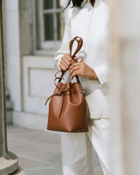 Mansur Gavriel on Instagram: “Our Mini Bucket Bag in Saddle Calf 🧡” Mansur Gavriel Bucket Bag, Poses Modelo, Shooting Bags, Hero Image, Photography Bags, Fall Bags, Fall Handbags, Mini Bucket Bags, Mini Bucket