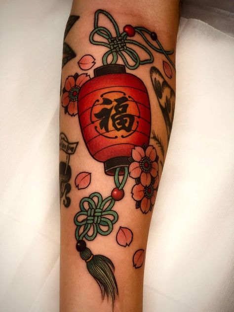 japanese tattoo designs Japanese Bell Tattoo, Neojapan Tattoo, Japanese Peach Tattoo, Japanese Filler Tattoos, Meaningful Japanese Tattoos, Japanese Charm Tattoo, Omamori Tattoo Design, Japan Traditional Tattoo, Chinese Lantern Tattoo