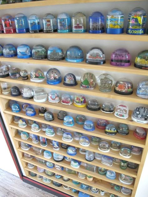 One day I will have a specific and permanent display area for all of my snowglobes too! Globe Display, Vintage Snow Globes, Souvenir Display, Southeast London, Travel Wall Decor, Travel Keepsakes, Water Globes, London Home, Bonsai Garden