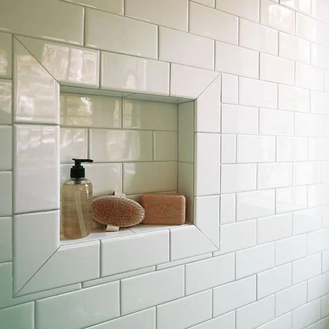 White Beveled Subway Tile, White Subway Tile Shower, Tile Shower Niche, Tiled Bathroom, Beveled Subway Tile, Monochromatic Room, Subway Tile Showers, Coloured Grout, Subway Tiles Bathroom