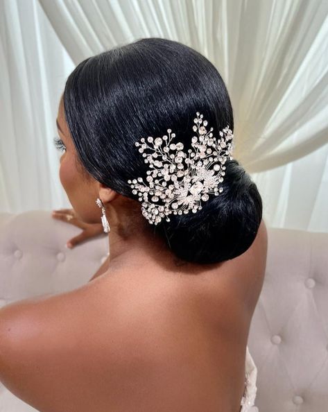 female model wearing silver bridal hair comb with single crystal center, clusters, and sparkling sprays above a bun Wedding Bun, Boda Ideas, Crystal Comb, Dinner Dress Classy, Elegant Hair, Hat Accessories, Bride Hair, Dress Classy, Wedding 2024