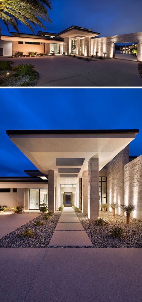 Setback from the road, the modern house has a covered entry with uplighting, and an oversized glass front door. #ModernHouse #Landscaping #Architecture Living On An Island, Architecture Homes, Desert House, Luxury Garden, Living Modern, House Front Door, The Modern House, Desert Homes, Front House Landscaping