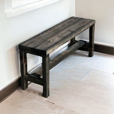 Have a seat and take a load off on this sleek entry bench. The sturdy solid wood build makes for a perfect accent in any space where you require added seating. With a black base and brown top, the contemporary look and neutral tones fit well with an array of styles and palettes. Rustic, real wood character brings warmth to your space with unique wood grain, knots, and markings from the reclaimed seat. Don't have time for setup? No problem! This item is shipped fully assembled and ready to use ri Reclaimed Wood Benches Entryway, Front Door Bench Entryway, Foyer Bench Ideas Entry Ways, Rustic Entry Bench, Front Entry Bench, Wooden Bench Indoor, Door Bench, Entrance Bench, Diy Entryway Bench