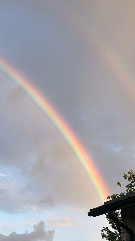 Double rainbow with dark clouds behind in the sky. Rainbow Nature, Rainbow Wallpaper Iphone, 16th Birthday Outfit, Optical Phenomena, Grid Wallpaper, Rainbow Pictures, Sky Photography Nature, Double Rainbow, Fluffy Clouds