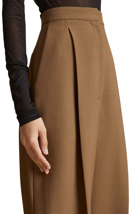 These tapered pants exude modern sensibility with a high waist and neat pleats in a tasteful, toffee-inspired hue. 13" inseam; 17" leg opening; 17" front rise; 21" back rise (size 8) Zip fly with hook-and-bar closure Back welt pockets 75% viscose, 25% polyamide Partially lined Dry clean Imported Designer Clothing Tapered Pants, Toffee, Welt Pockets, New Outfits, Leg Pants, Designer Clothing, High Waist, Size 12, Dry Clean