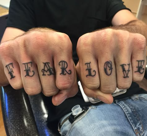 Knuckle tattoo set by Violet Page Knuckle Font Tattoo, Love On Finger Tattoo, Word Tattoos On Fingers, Men Knuckle Tattoos, Fear Love Tattoo, Finger Knuckle Tattoo, Finger Tattoos Men Words, Knuckle Tattoo Lettering, Finger Tattoos Words Knuckles